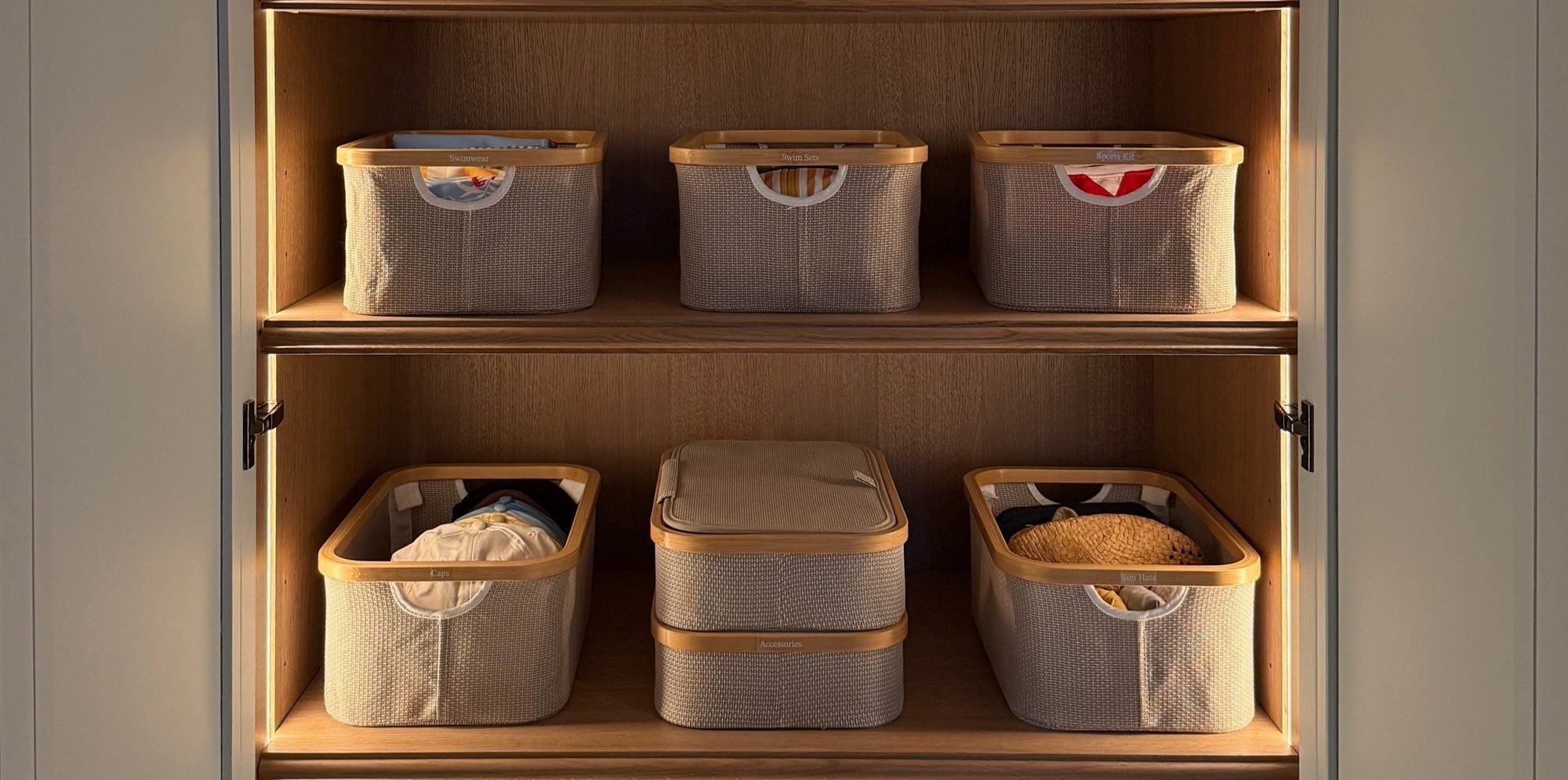 Lidded baskets on cupboard shelves.