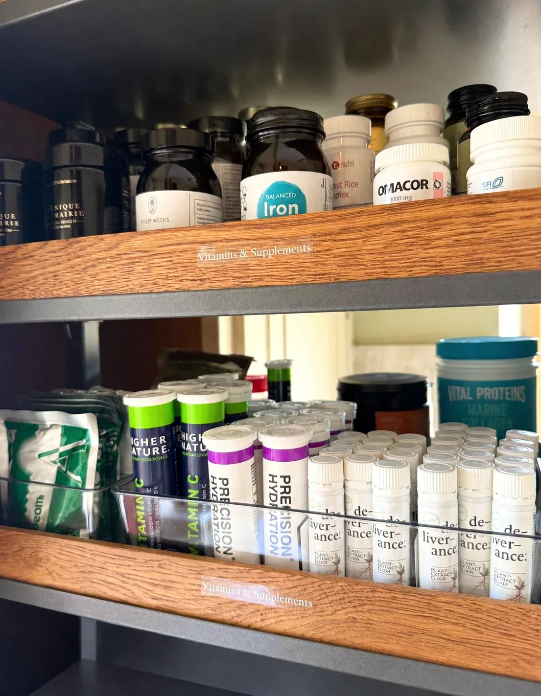 Condiments and baking supplies on two pantry shelves.